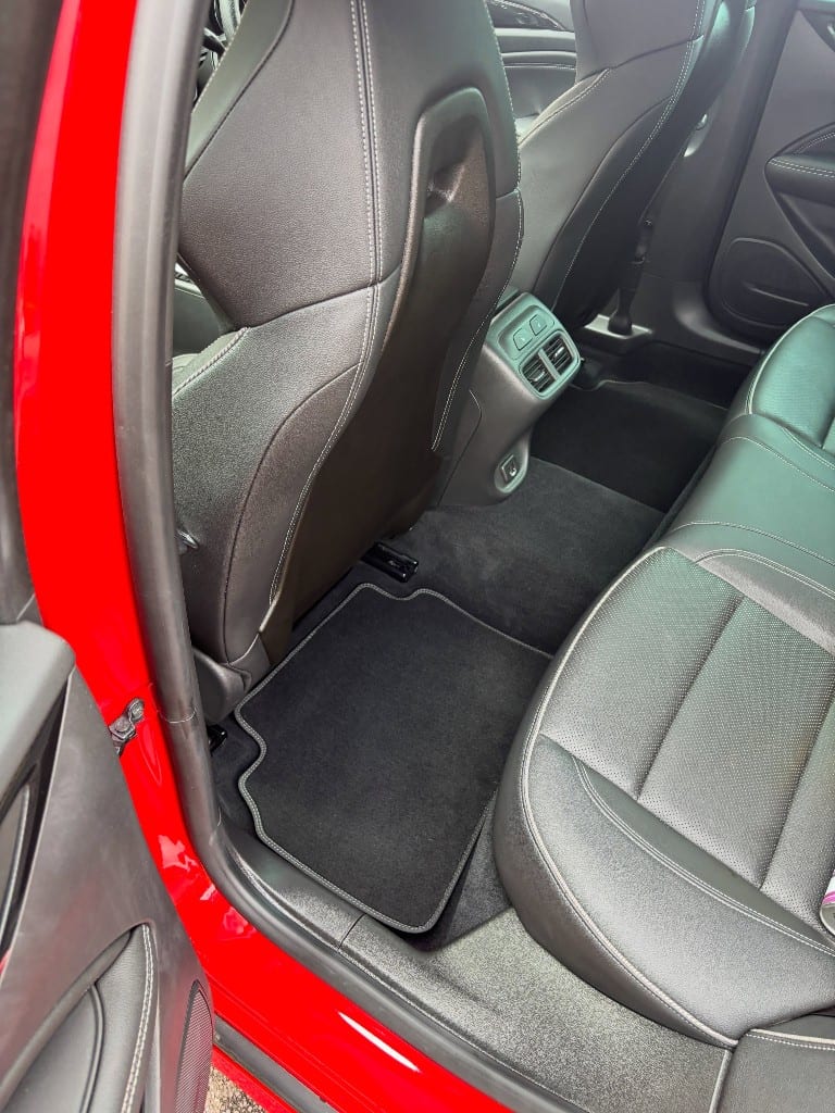 Rear seats vacuumed, mats cleaned and interior refreshed after detailing