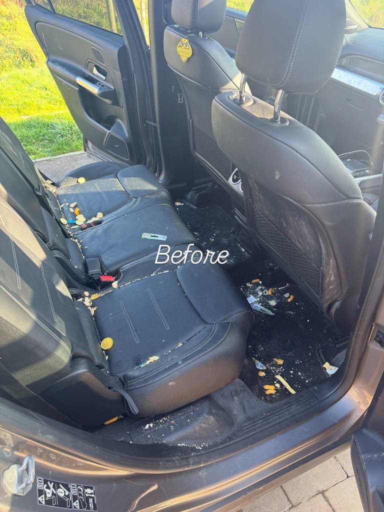 Mercedes GLB rear seats and floor covered in crushed crisps and crumbs before cleaning