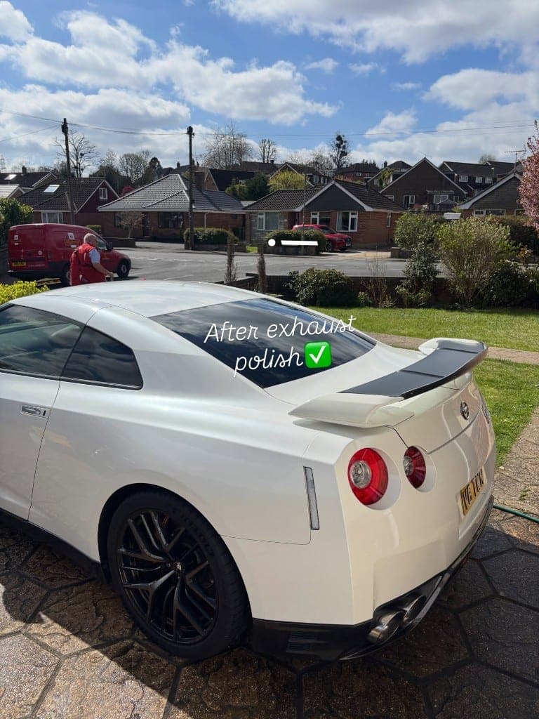 White Nissan GT-R gleaming after a machine polish and exhaust tip polish