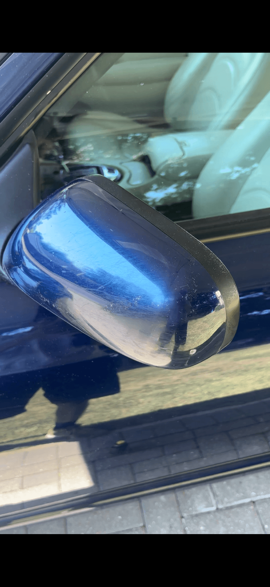 Jaguar XK wing mirror before paint correction